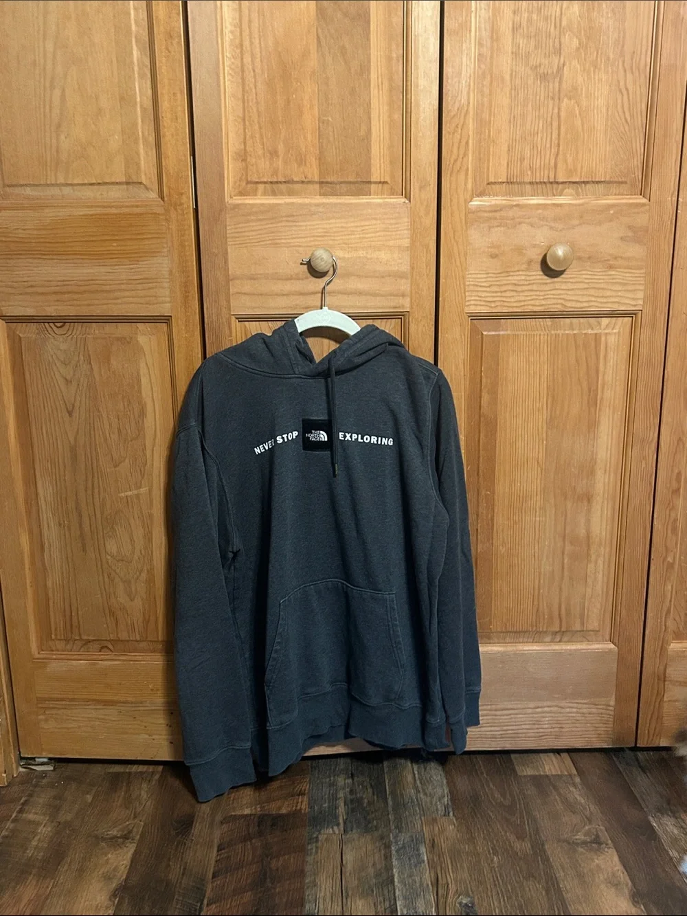 The North Face charcoal black pullover hoodie with white logo